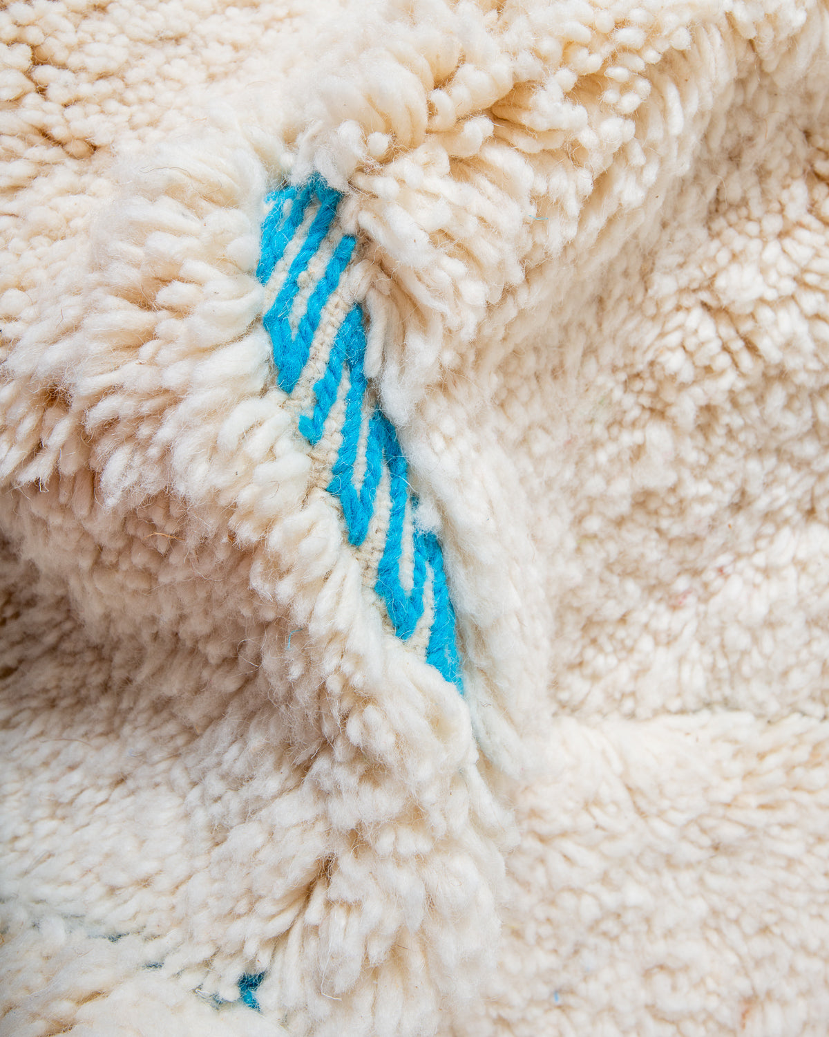 Modern, designer, handcrafted Berber rug from Morocco. Beniourain carpet with beautiful colours and patterns and fluffy wool texture.